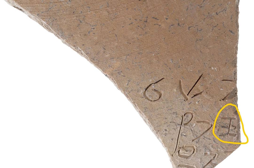 An inscription using early Semitic letters on a potsherd discovered in Israel