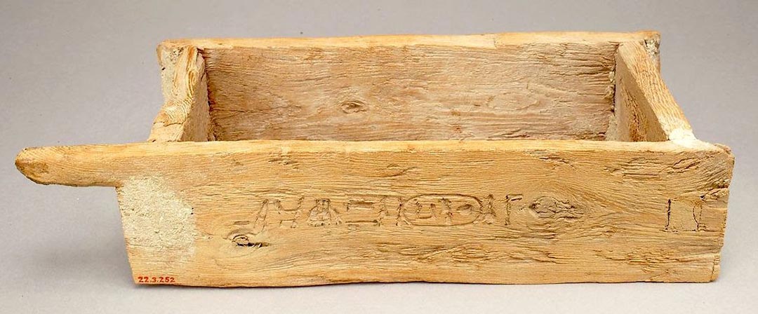 A miniature wooden mold used in the ancient world to sculpt bricks