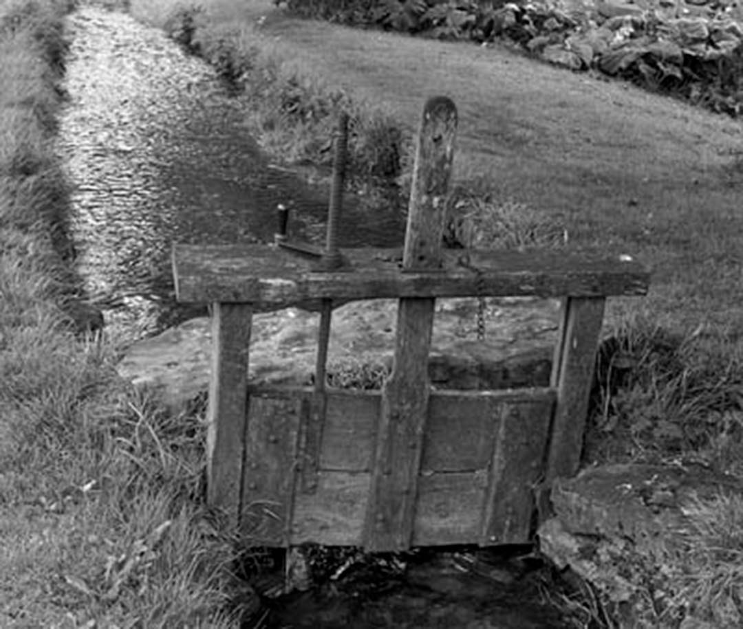 Photo of ancient sluice gate crossing by Linda Mellor